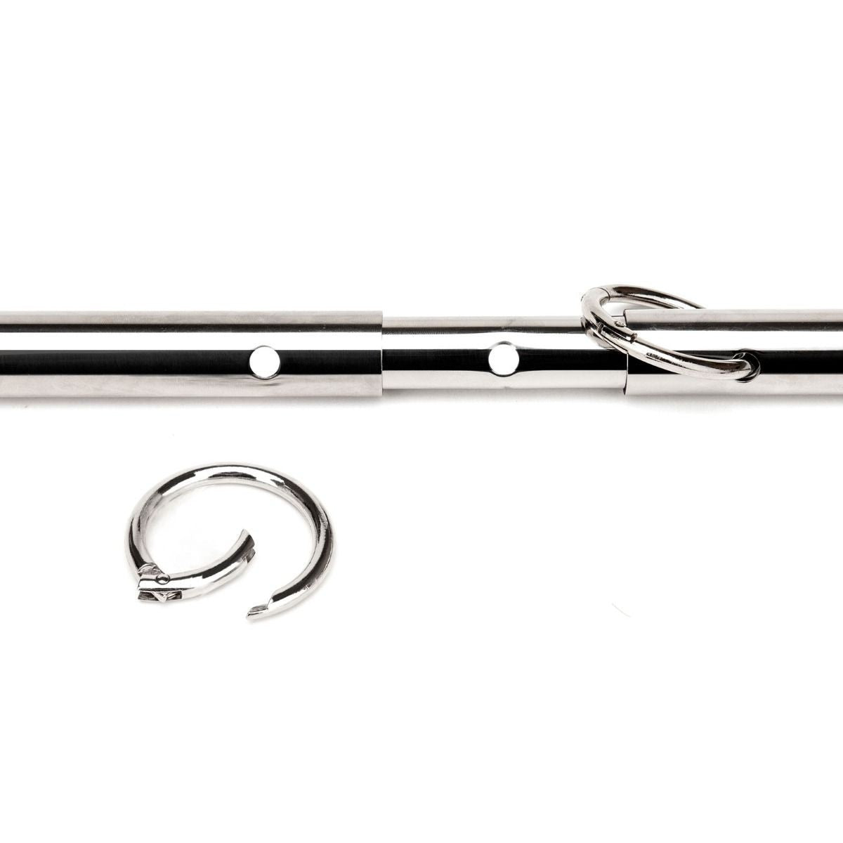 Metal bondage rod with two hooks on a white background