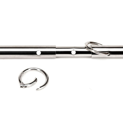 Metal bondage rod with two hooks on a white background