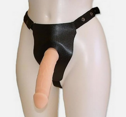 Black satin thong with a pink silicone dildo on a mannequin against a white background