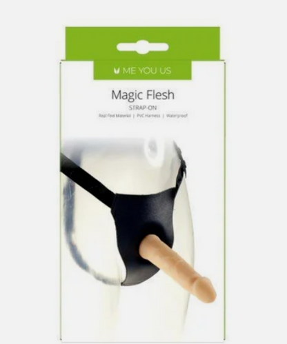 Packaged 'Magic Flesh' strap-on with a mannequin on a white background