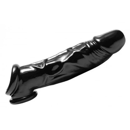 Black Penis extender sleeve on a white background