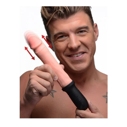 Man holding a black cylindrical object with red arrows pointing to his finger, on a white background