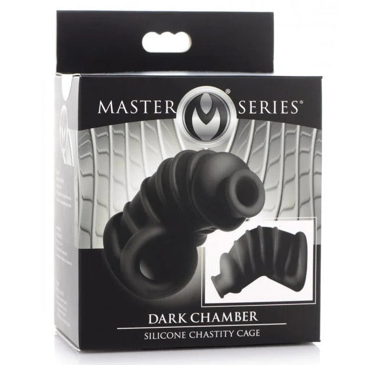 Packaging of Master Series Dark Chamber silicone chastity cage on a white background