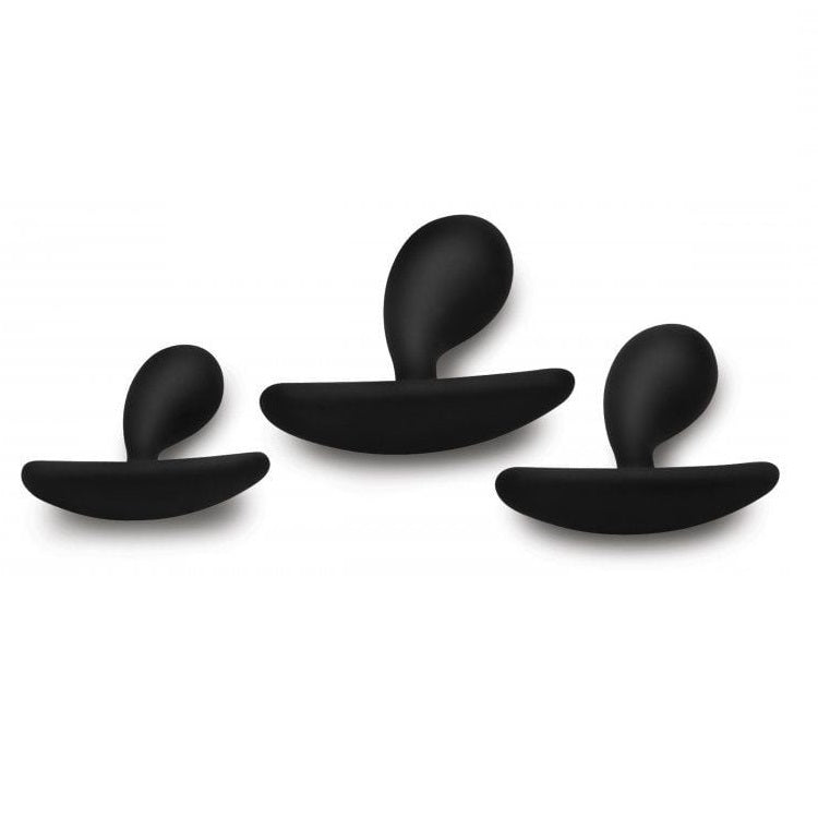 Three black anal plugs on a white background