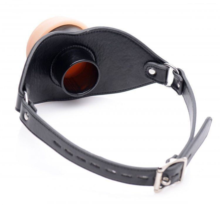 Black leather muzzle with a strap on a white background