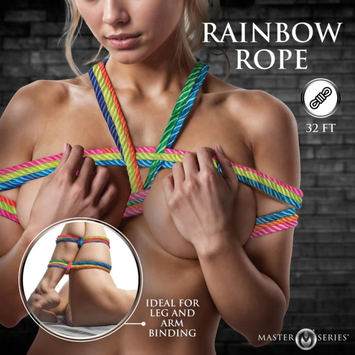 Person wearing rainbow rope with close-up of leg, against a dark brick wall background.