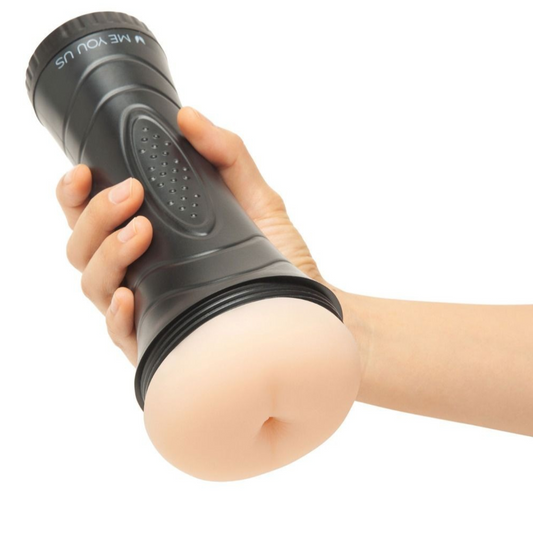 Hand holding a black fleshlight against a white background