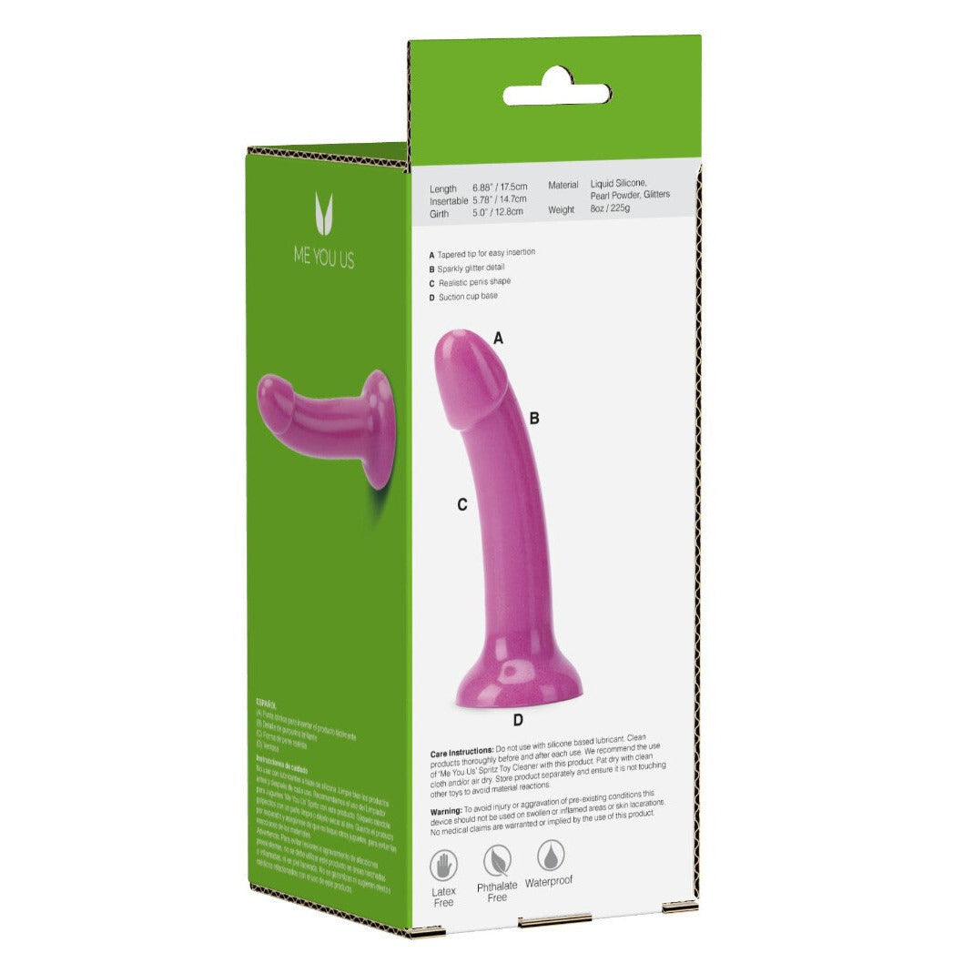 Purple sex toy with green and white packaging on a white background