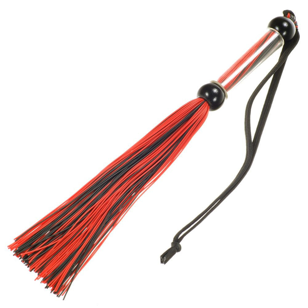 Red and black flogger with a metal handle on a white background