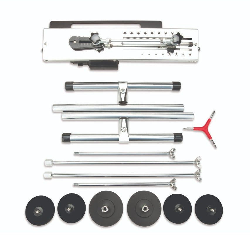 Set of metal rods, wheels, and a tool on a white background