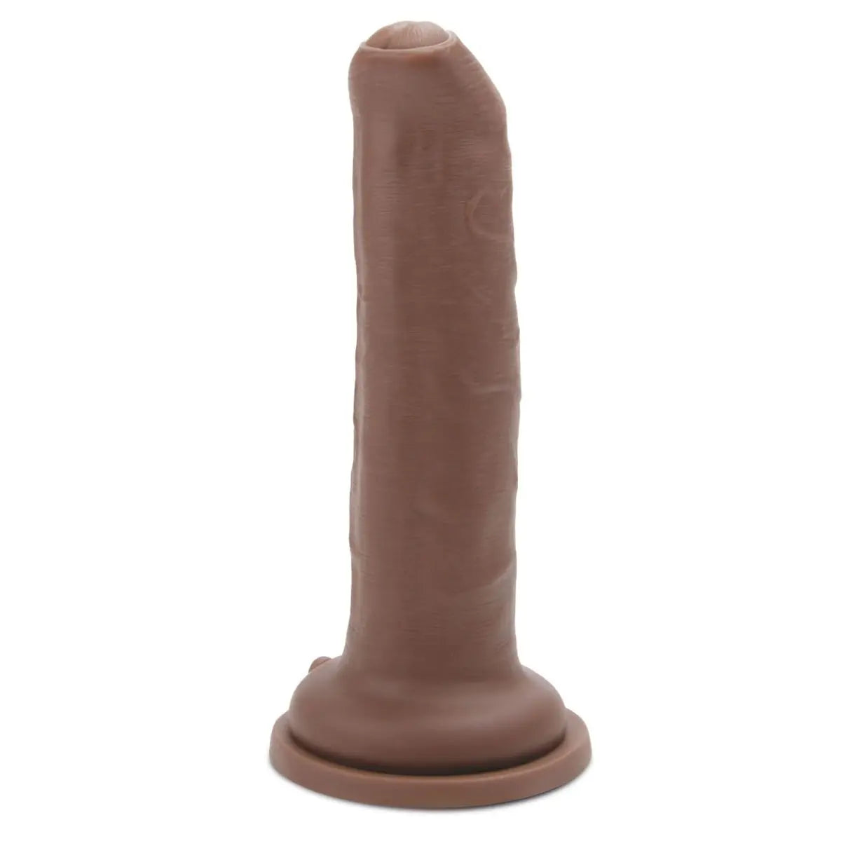 Brown silicone dildo on a white background