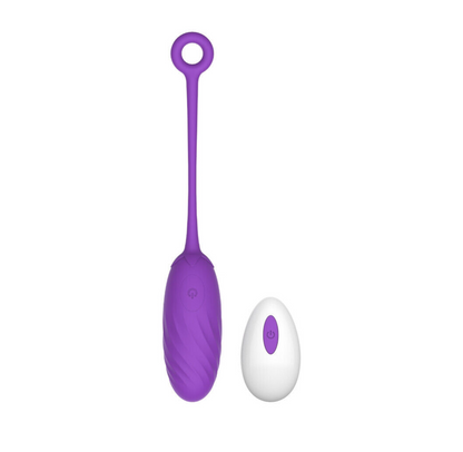Purple and white egg-shaped vibrator on a white background
