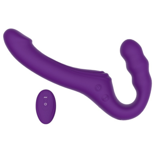 Purple silicone strapless strap-on with remote control on a white background