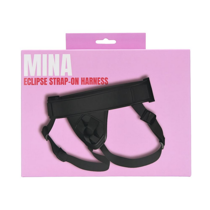 Black strap-on harness on pink packaging with 'Mina' branding