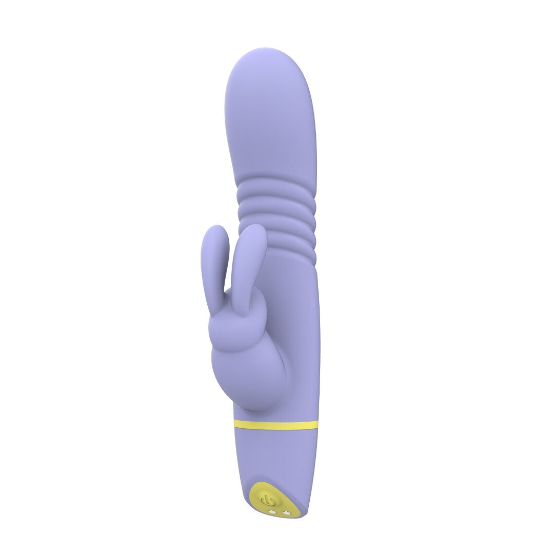 Purple rabbit-shaped sex toy with a yellow base on a white background