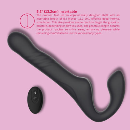 Black ergonomic strap-on with text on a pink background