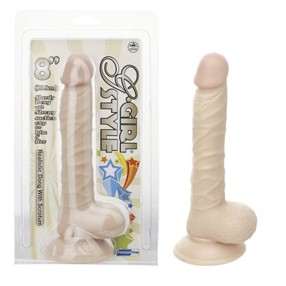 Realistic dong with scrotum sex toy next to its packaging on a white background