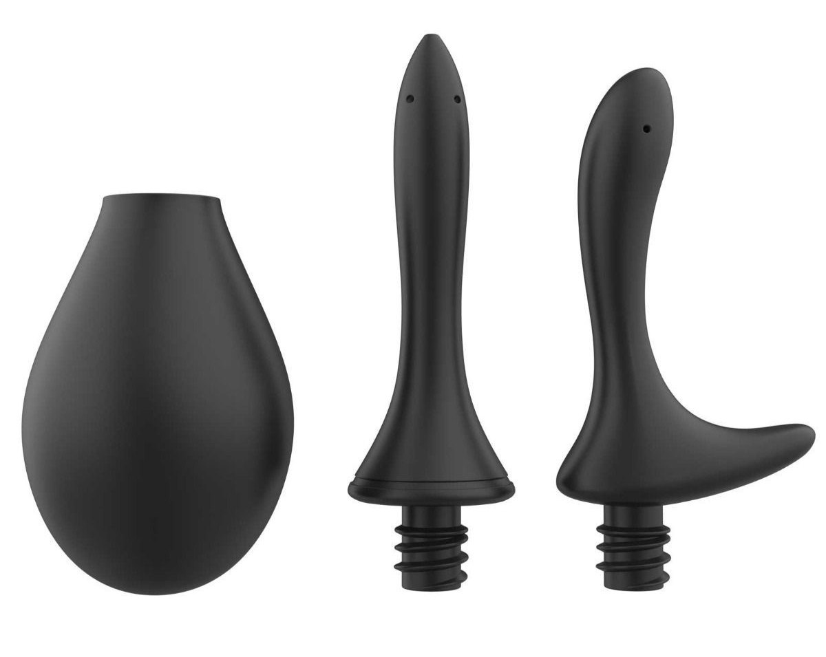 Set of three black silicone douche attachments on a white background