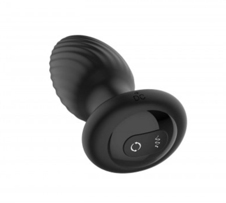 Black silicone butt plug with control button on a white background
