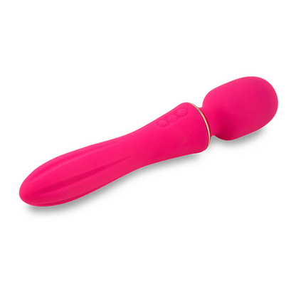 Pink silicone massager on a white background