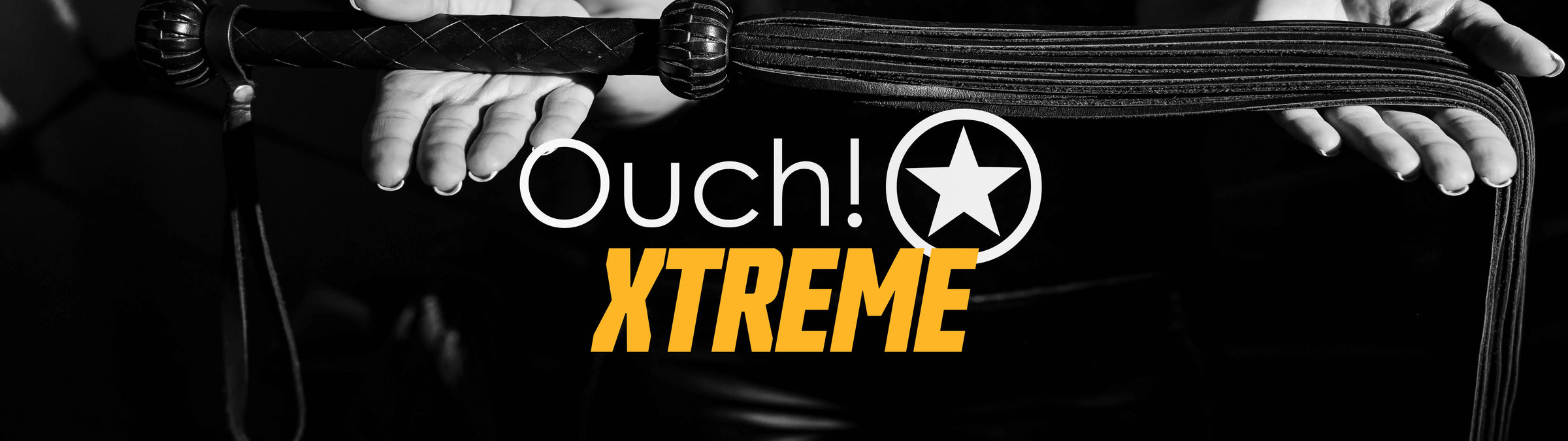 Black flogger with 'Ouch! XTREME' branding on a dark background