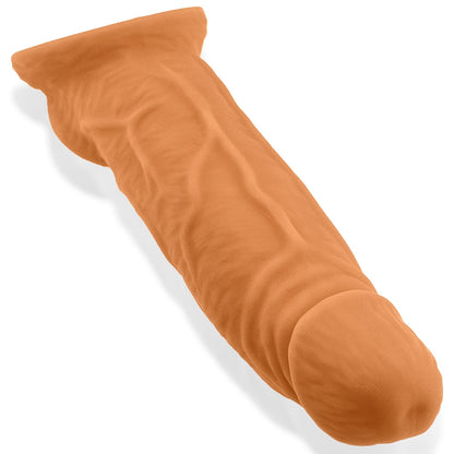 Flesh Coloured silicone penis extender sleeve on a white background