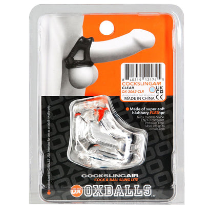 Cock sling air product packaging with clear cock and ball sling on an orange and black background