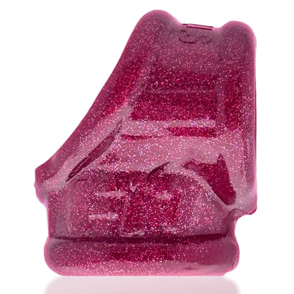 Pink glittery object on a white background