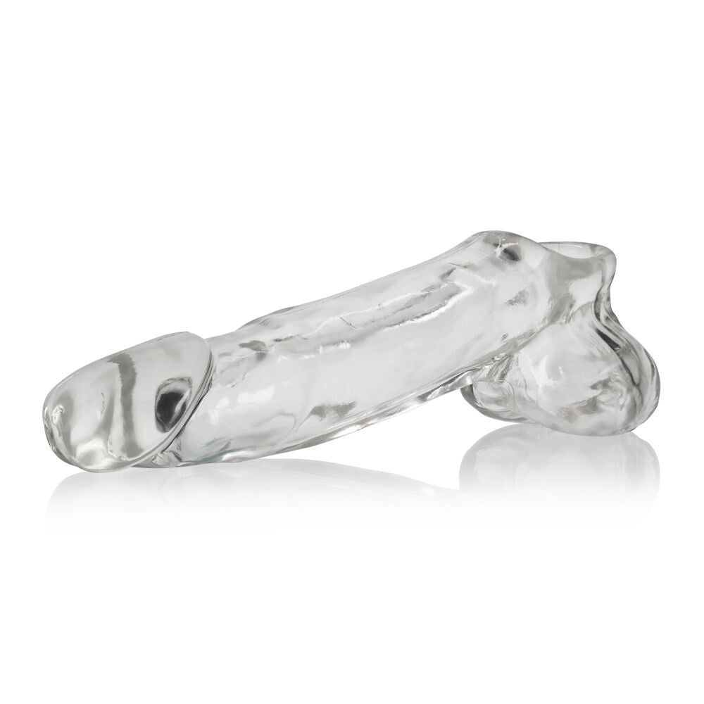 Clear penis extender sleeve on a white background