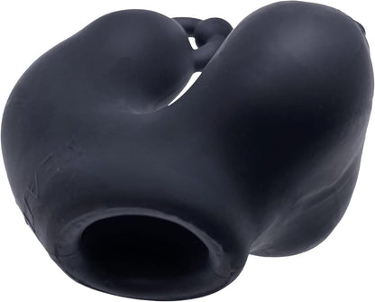 Black silicone penis sleeve chastity device on a white background
