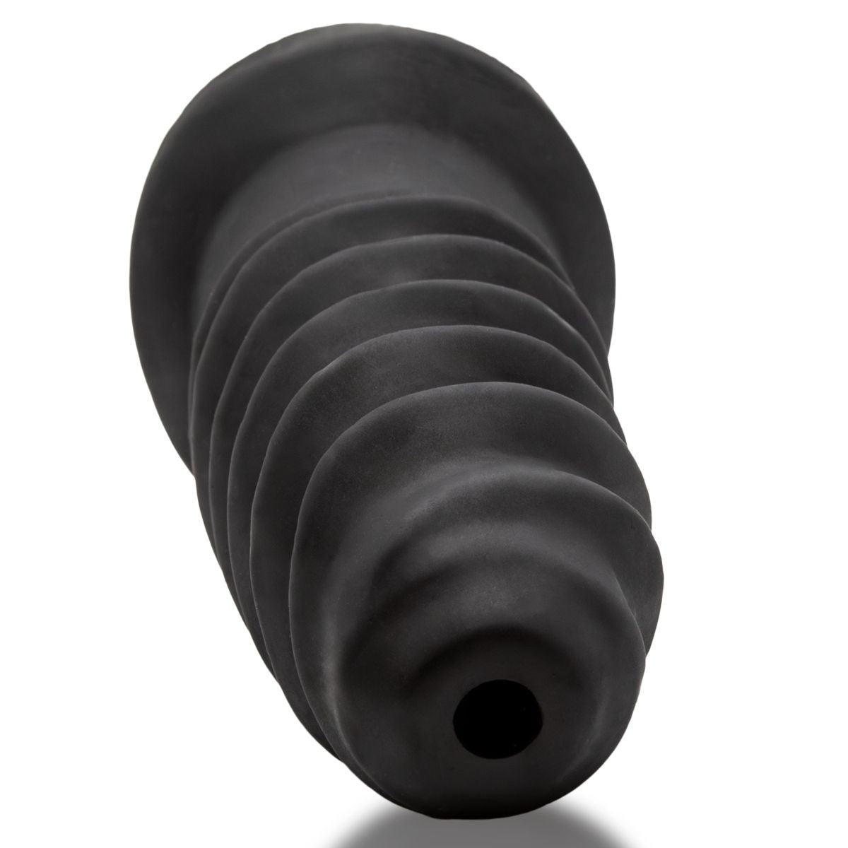 Black silicone butt plug on a white background