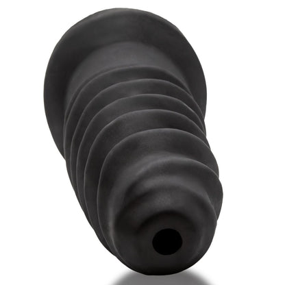 Black silicone butt plug on a white background