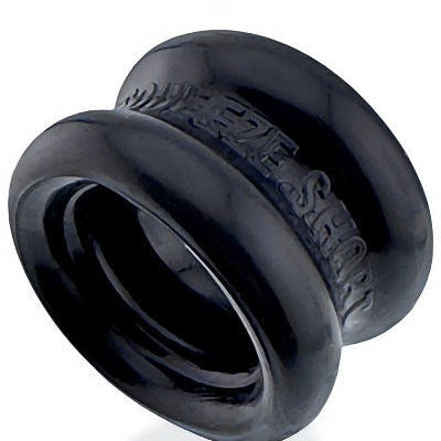 Black silicone cock testicle ring with branding on a white background
