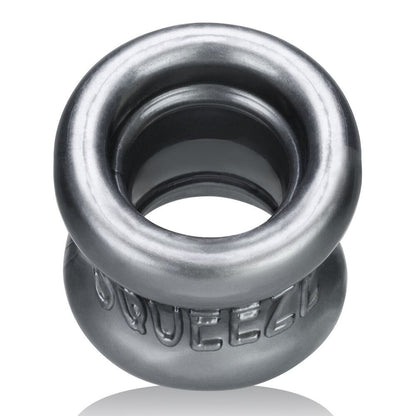 Metallic ring with 'Oxballs Squeeze' branding on a white background