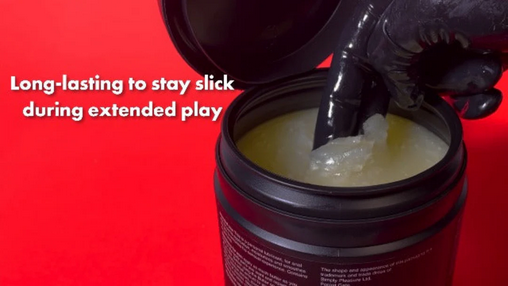 Jar of lubricant with gloved hand applying it, red background with text about product performance.