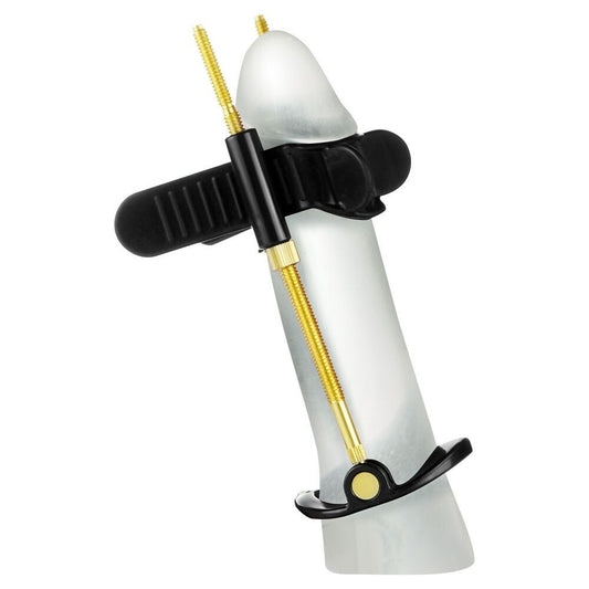 White and black penis stretcher with gold accents on a white background