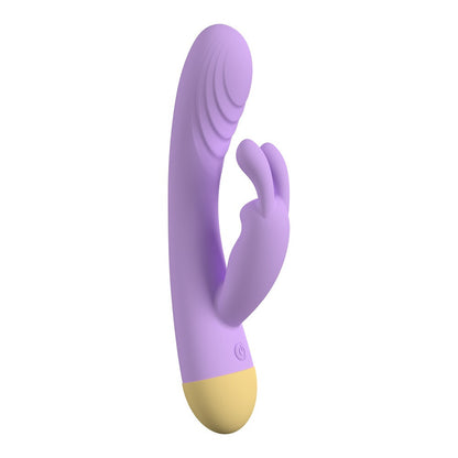 Purple and yellow silicone rabbit vibrator on a white background