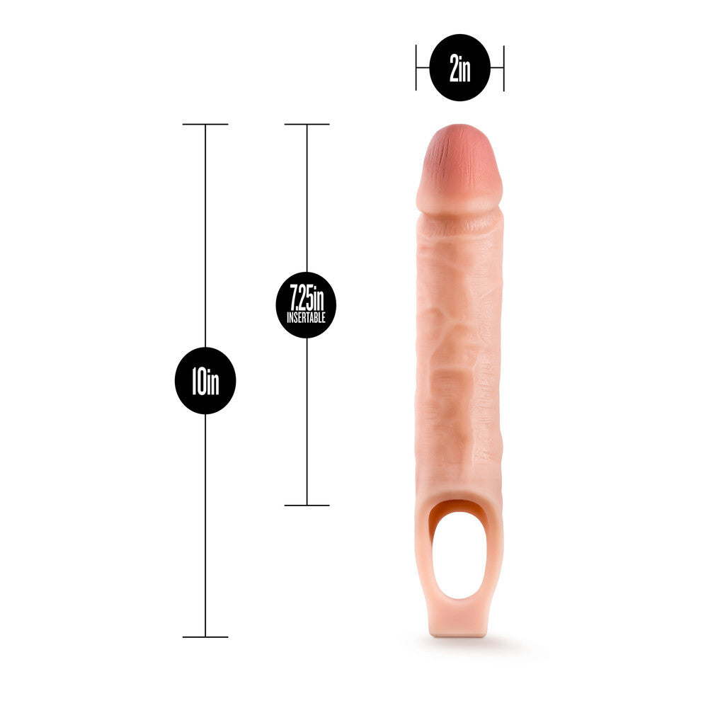 Measurement chart of a pink penis extender with dimensions labeled on a white background