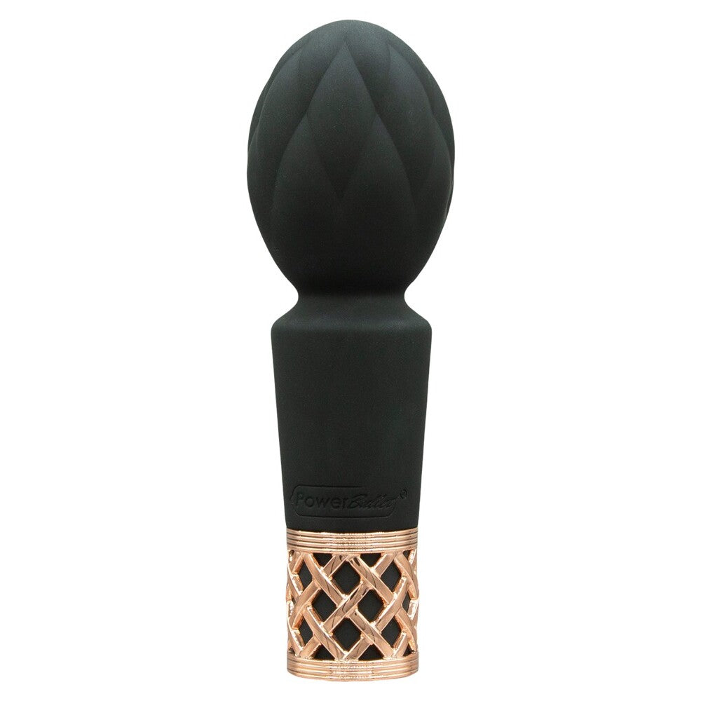 Black and gold massage wand on a white background