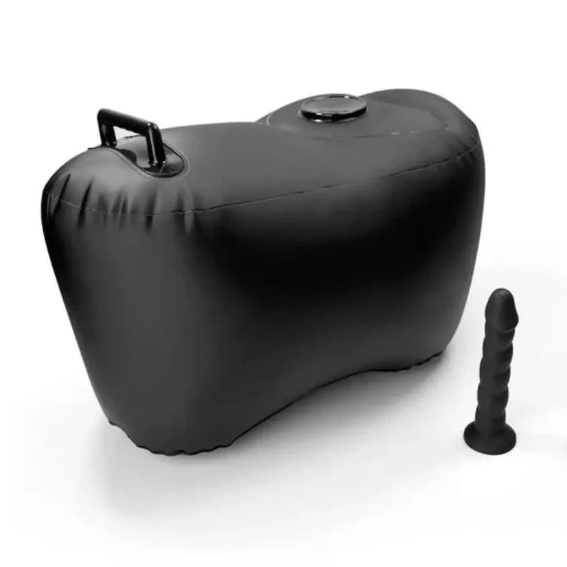 Black inflatable sex pillow with silicone dildo on a white background
