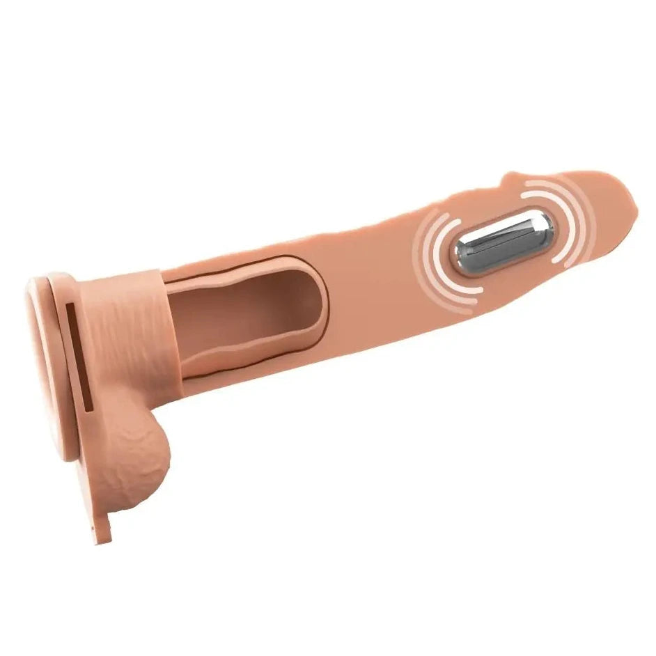 Pink silicone hollow strap-on with a metallic component on a white background
