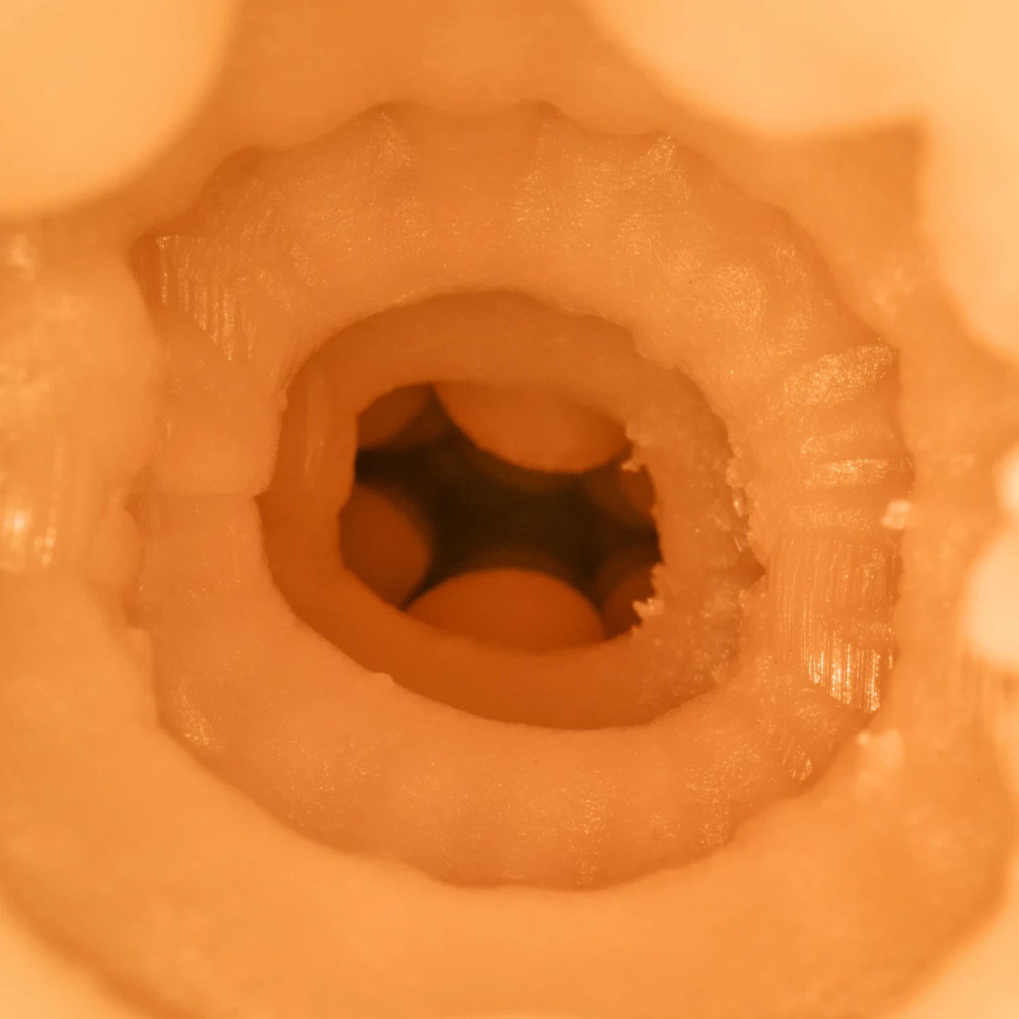 Close-up of a textured pussy with a central hole.