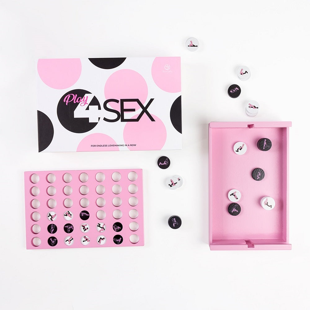 Sex toy packaging with pink and black design on a white background