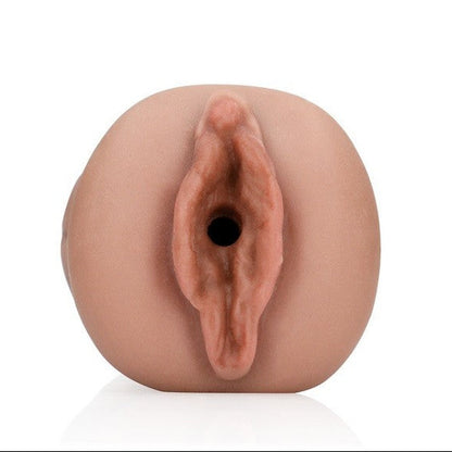 Realistic silicone model of a female reproductive organ on a white background