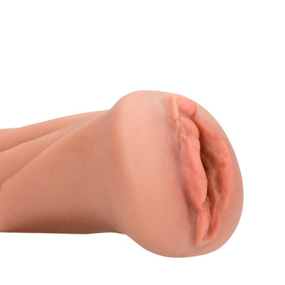 Realistic silicone model of a female pussy on a white background