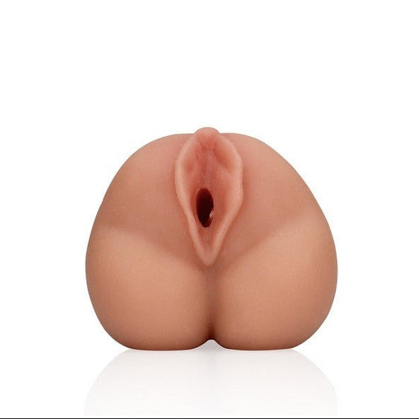 Silicone product shaped like a vagina  on a white background