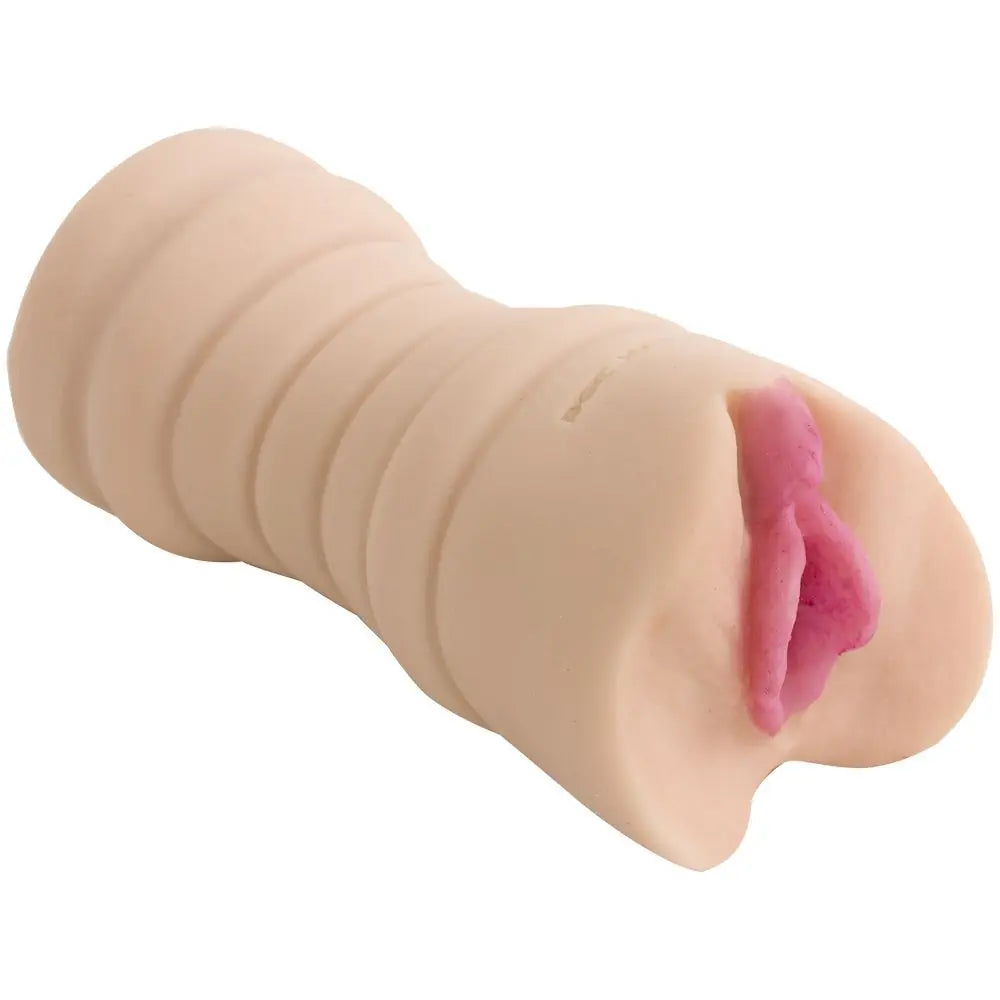 Realistic silicone model of a female reproductive organ on a white background