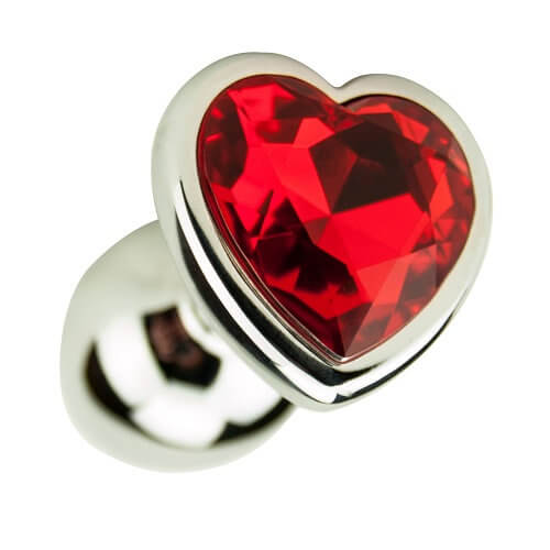Heart-shaped object with red gemstone and silver border on a white background