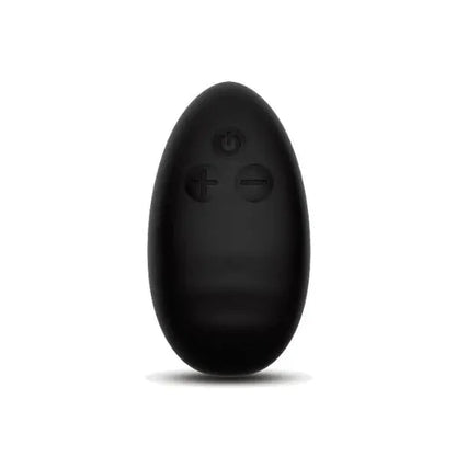 Black egg-shaped object on a white background