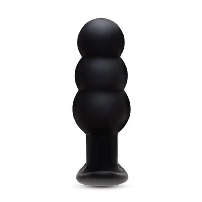 Black silicone butt plug vibrator massager on a white background